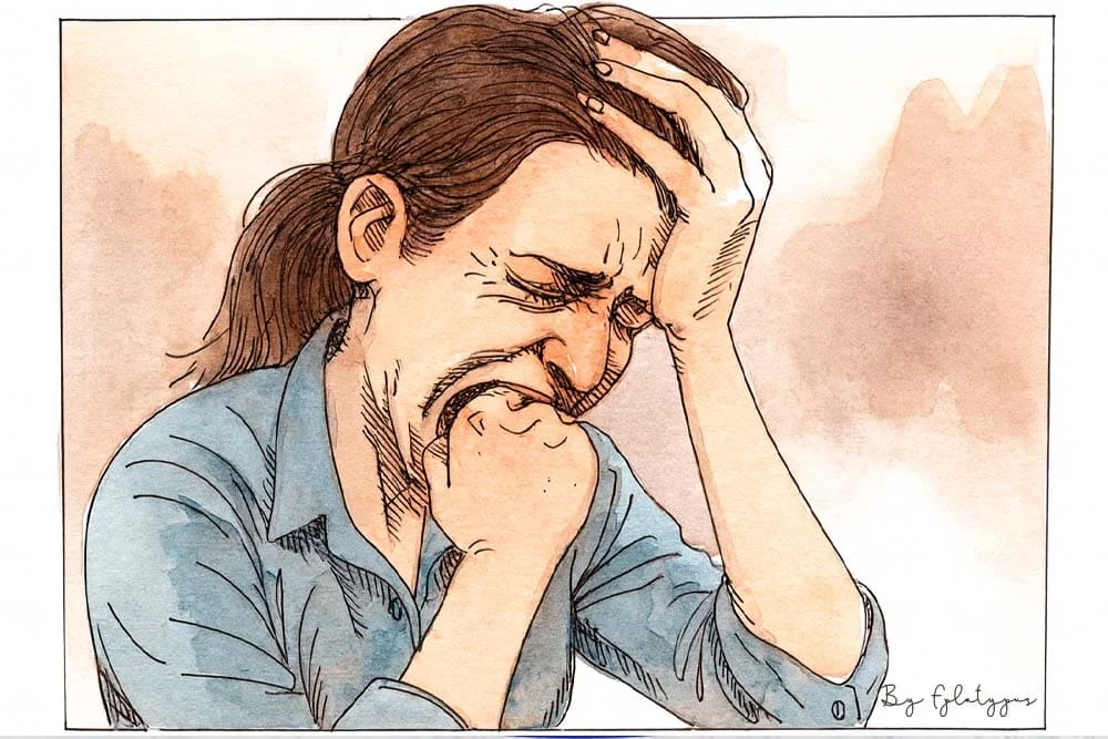 Caricatura de mujer angustiada con la cabeza entre las manos, reflejo de la crisis emocional.