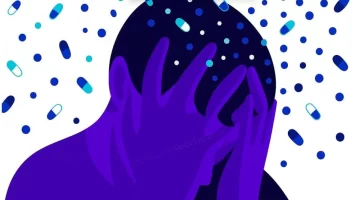 Ilustración de persona con la cabeza entre las manos rodeada de píldoras, símbolo de la salud mental en Colombia.